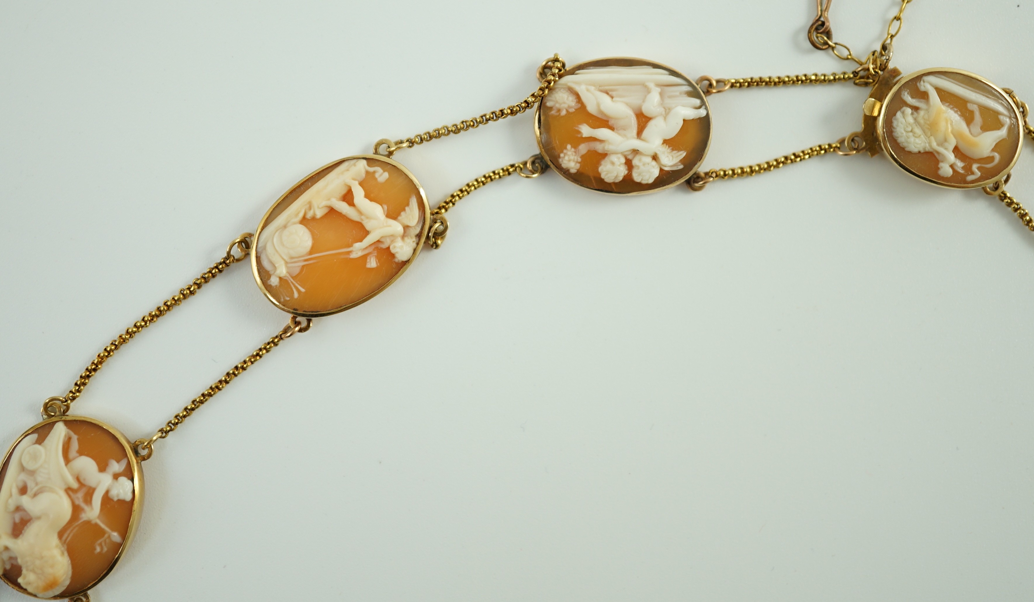 A late Victorian gold and graduated oval cameo shell necklace